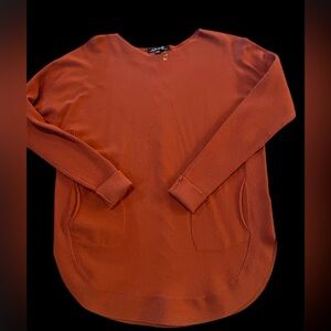 Charlies Rust Knit Sweater with front pockets and back details